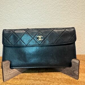 CHANEL Black Quilted Leather Clutch with CC Logo